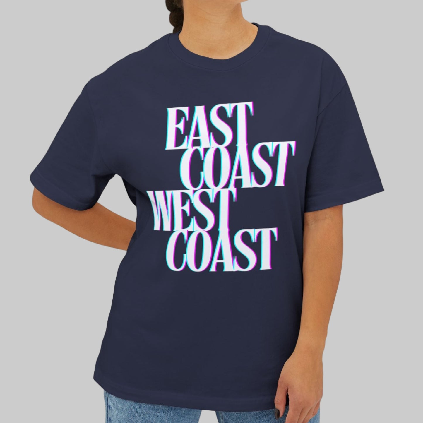 Person wearing a navy blue t-shirt with 'East Coast West Coast' text on a white background