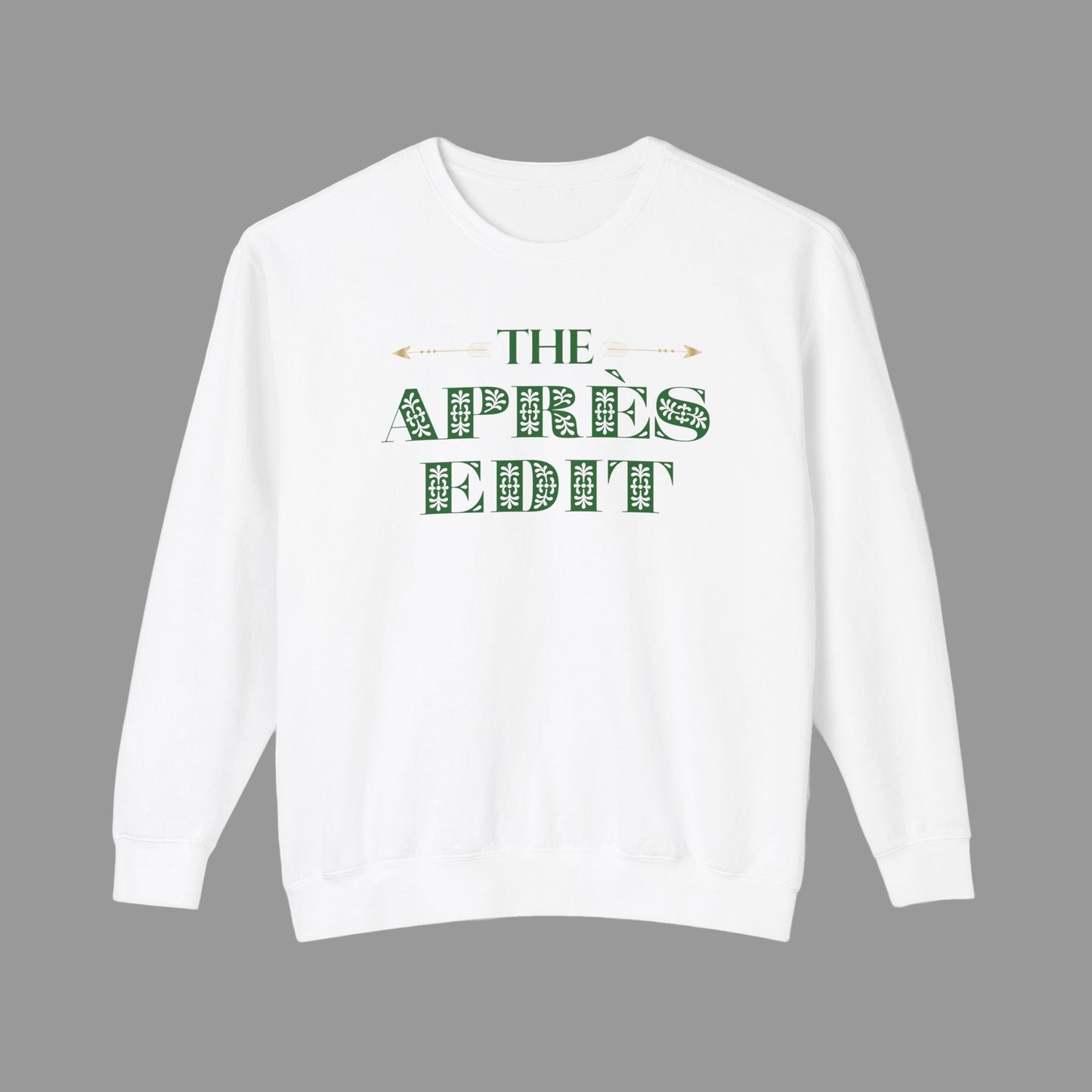 White sweatshirt with 'The Apres Edit' text in green on a white background