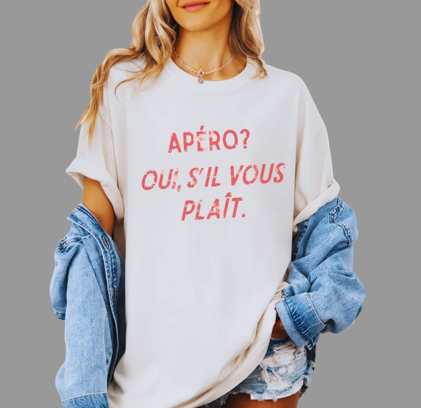 Person wearing a white t-shirt with red text and a denim jacket on a white background