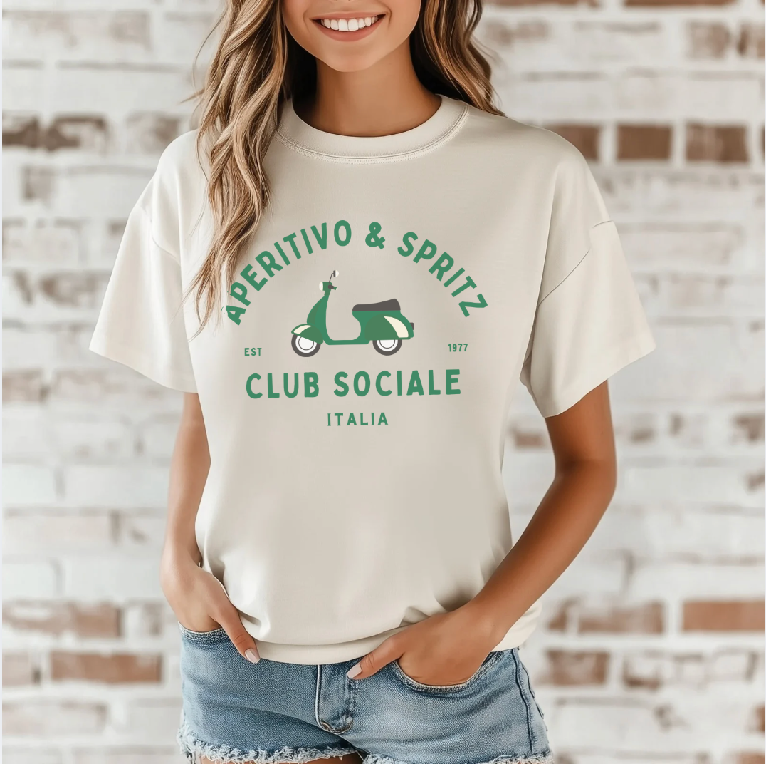 Aperitivo & Spritz Club Sociale Italian summer graphic tee with green Vespa design on cream shirt